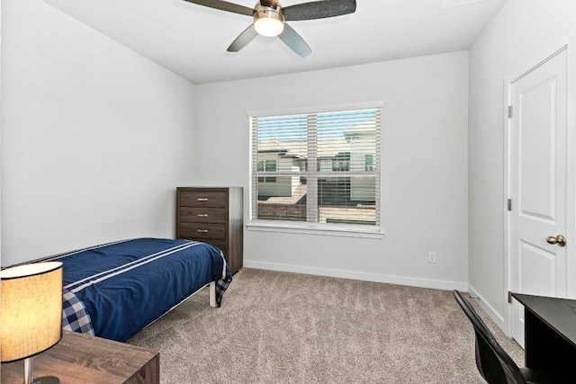 bedroom featuring baseboards, carpet, and a ceiling fan