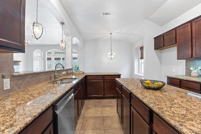 kitchen with decorative backsplash, arched walkways, dishwasher, a sink, and an inviting chandelier