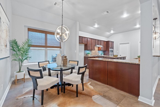 4801 Pyrenees Pass, Bee Cave, TX 78738 - dining space featuring a chandelier, baseboards, and vaulted ceiling