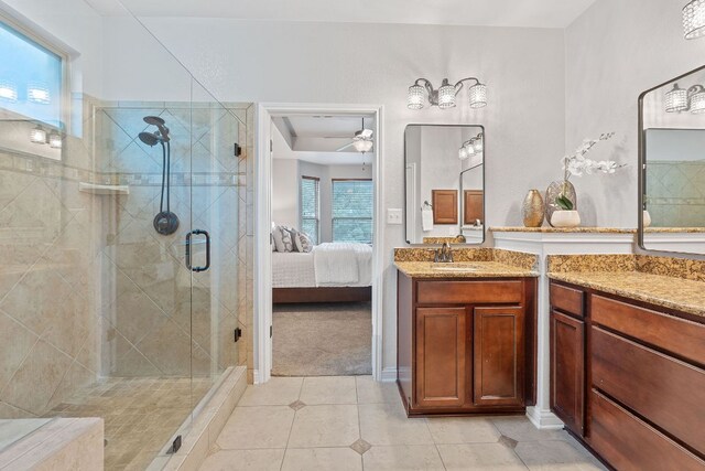 4801 Pyrenees Pass, Bee Cave, TX 78738 - bathroom featuring a shower stall, vanity, tile patterned flooring, connected bathroom, and a ceiling fan
