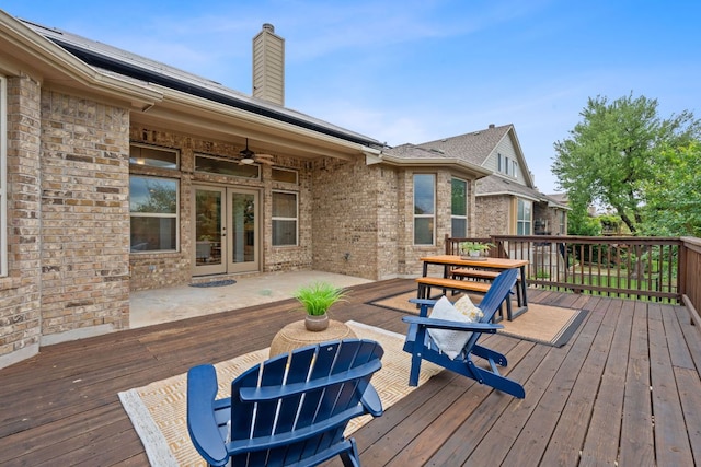 4801 Pyrenees Pass, Bee Cave, TX 78738 - wooden terrace featuring a ceiling fan, outdoor dining area, and french doors