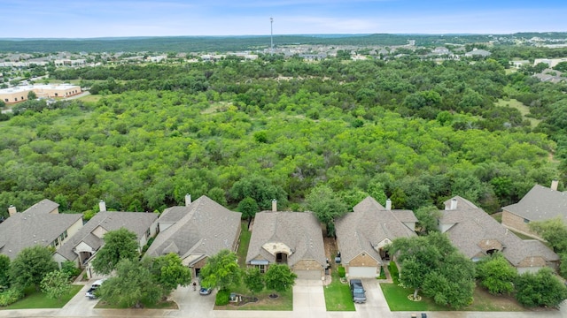 4801 Pyrenees Pass, Bee Cave, TX 78738 - aerial view of residential area featuring a heavily wooded area