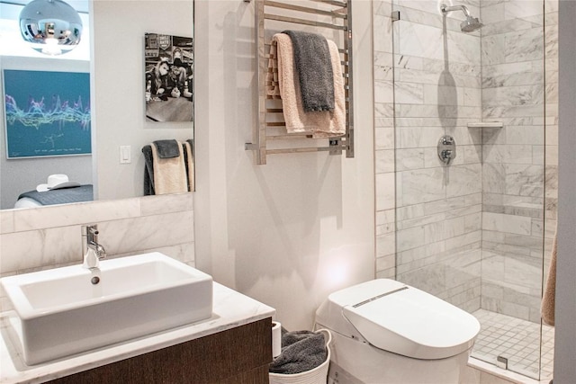 full bath featuring toilet, a stall shower, backsplash, and vanity