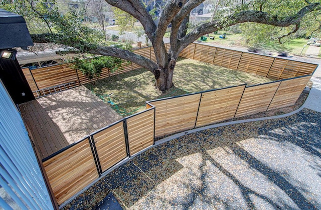 exterior space featuring a fenced backyard