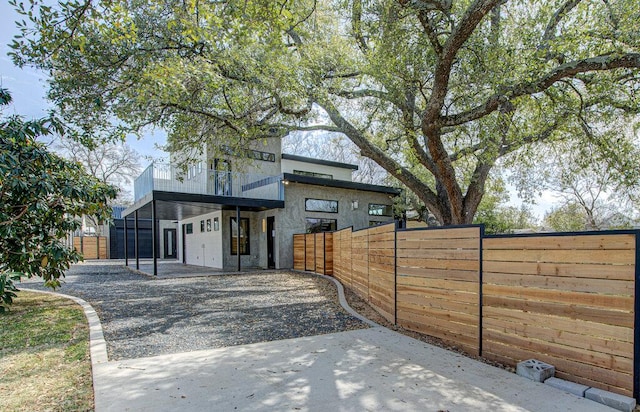 view of front of home with fence