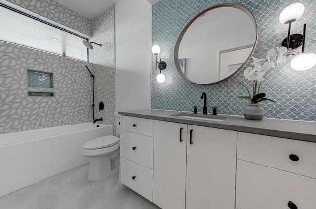 full bathroom featuring washtub / shower combination, vanity, toilet, and decorative backsplash