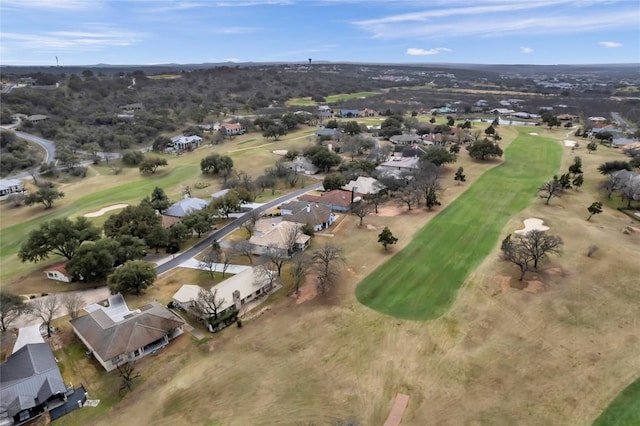 birds eye view of property with golf course view