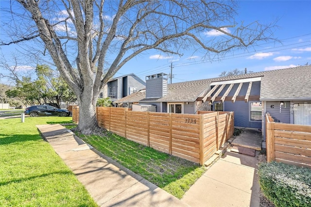 view of yard with a fenced front yard