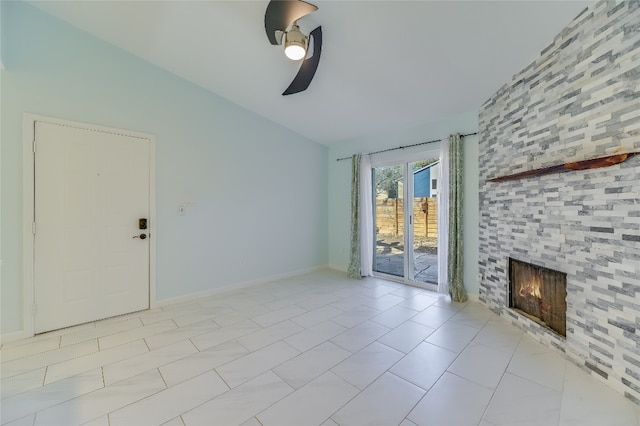 unfurnished living room with a fireplace, baseboards, and ceiling fan