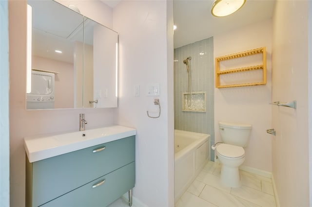 bathroom featuring toilet, vanity,  shower combination, baseboards, and tile patterned floors