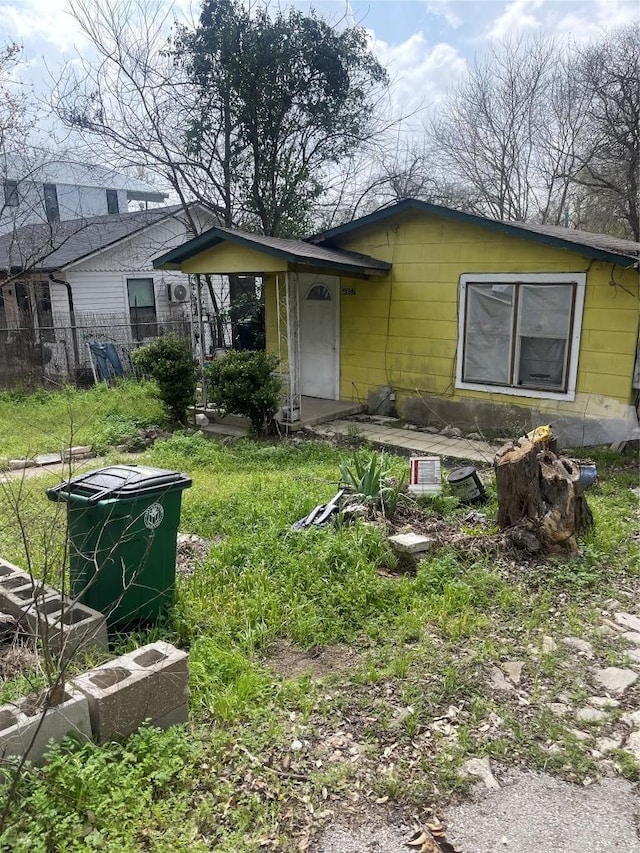 view of front of property with fence