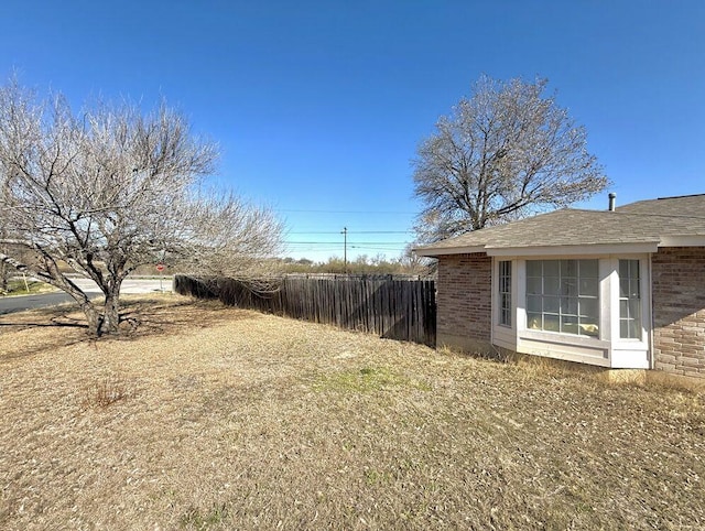 view of yard with fence