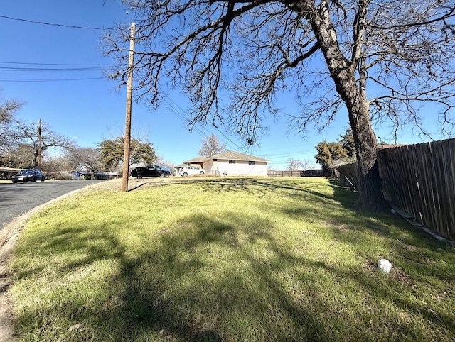 view of yard with fence