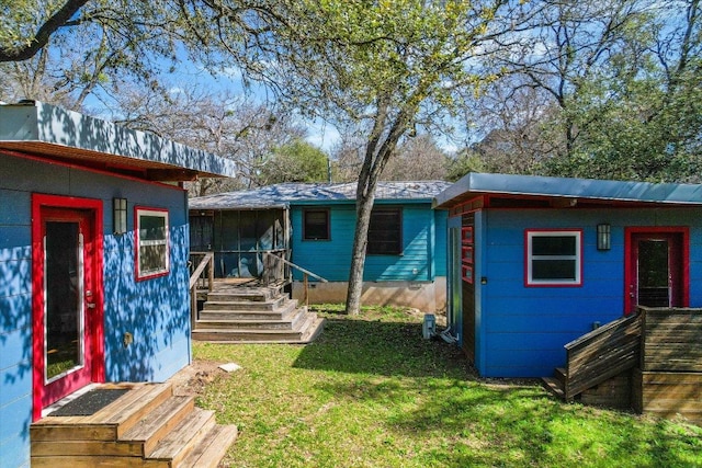 exterior space featuring a front lawn