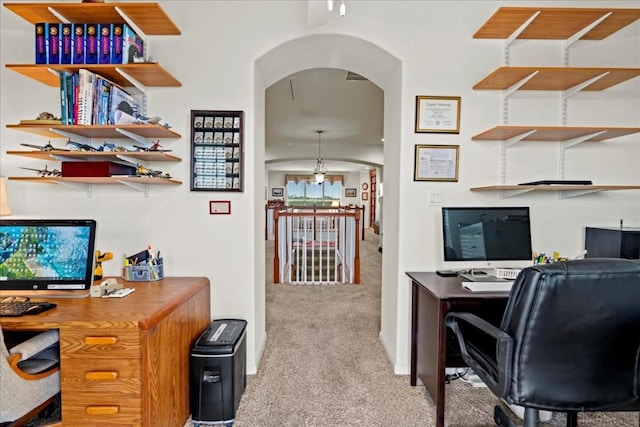 130 Cave Springs Rd, Wimberley, TX 78676 - home office with arched walkways and light colored carpet