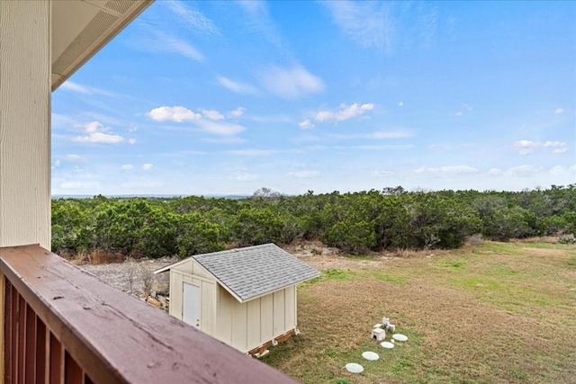 130 Cave Springs Rd, Wimberley, TX 78676 - view of grassy yard with a storage shed