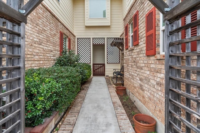 exterior space featuring brick siding