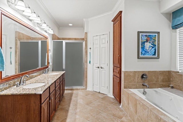 130 Cave Springs Rd, Wimberley, TX 78676 - bathroom with double vanity, a shower stall, ornamental molding, a jetted tub, and a closet