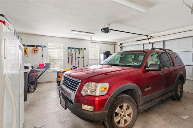 130 Cave Springs Rd, Wimberley, TX 78676 - garage with a garage door opener