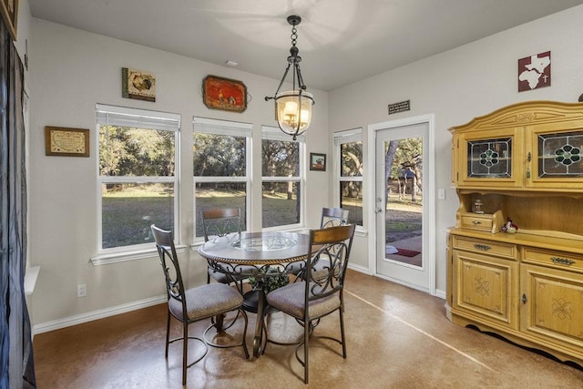 dining space with baseboards