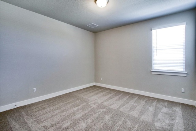 121 Pinnacle Ln, Kyle, TX 78640 - unfurnished room with carpet and baseboards