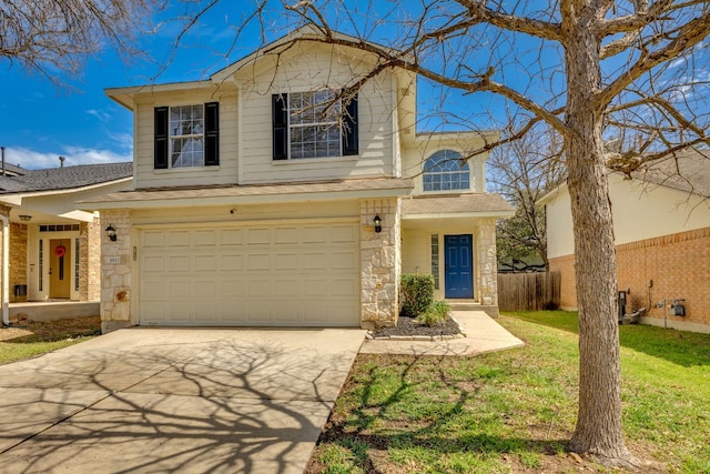 traditional-style house with a garage, fence, driveway, stone siding, and a front lawn