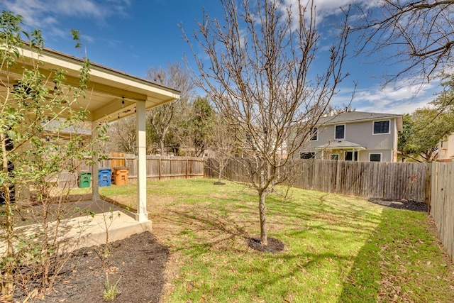 view of yard featuring a fenced backyard