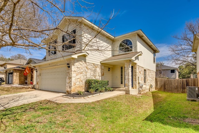 traditional home with central air condition unit, fence, stone siding, concrete driveway, and a front lawn