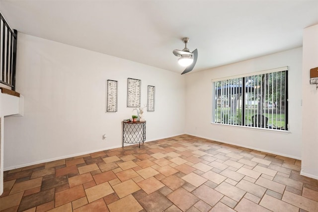 9504 Quail Village Ln, Austin, TX 78758 - empty room with a ceiling fan and baseboards
