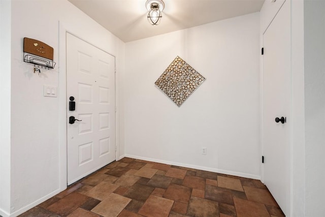 9504 Quail Village Ln, Austin, TX 78758 - foyer with dark stone finish flooring and baseboards