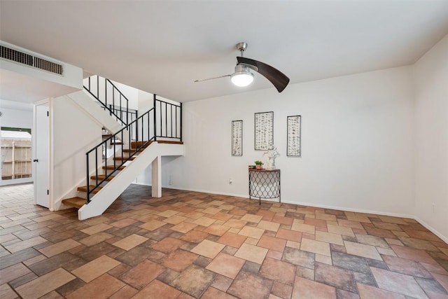 9504 Quail Village Ln, Austin, TX 78758 - unfurnished living room with a ceiling fan and stairs
