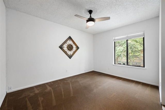 9504 Quail Village Ln, Austin, TX 78758 - unfurnished room featuring dark colored carpet, ceiling fan, and a textured ceiling