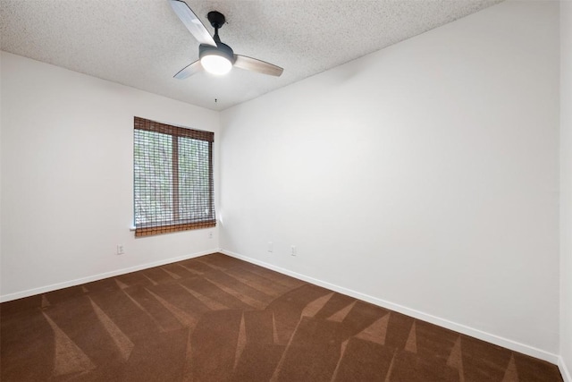 9504 Quail Village Ln, Austin, TX 78758 - unfurnished room featuring dark colored carpet, ceiling fan, and a textured ceiling
