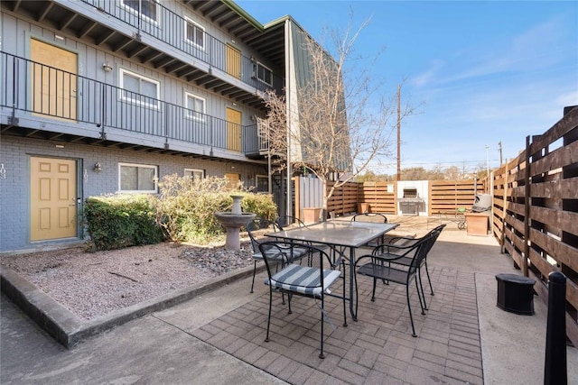 view of patio with fence