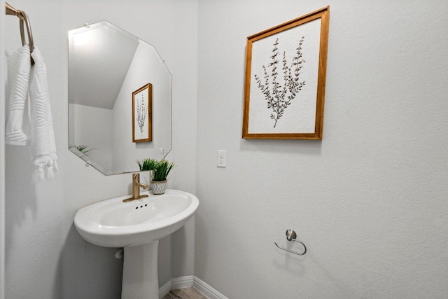 bathroom with baseboards