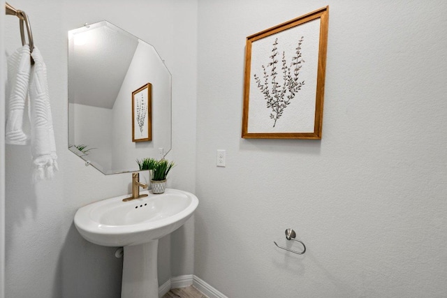 bathroom featuring baseboards