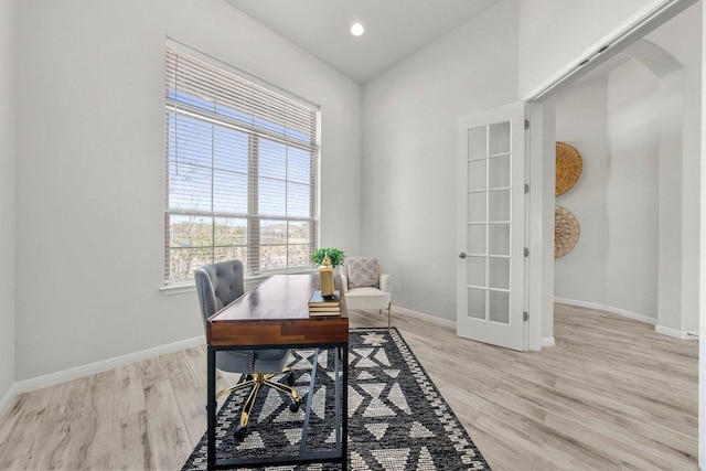 home office featuring light wood-style floors, baseboards, and recessed lighting