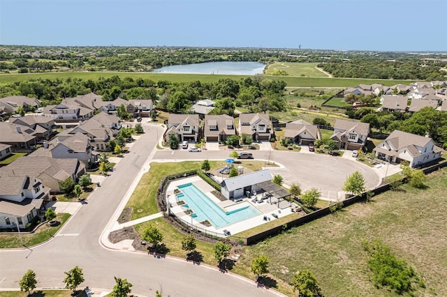 bird's eye view featuring a residential view and a water view