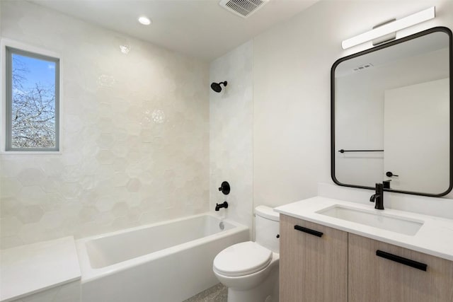 bathroom with toilet, washtub / shower combination, vanity, and visible vents