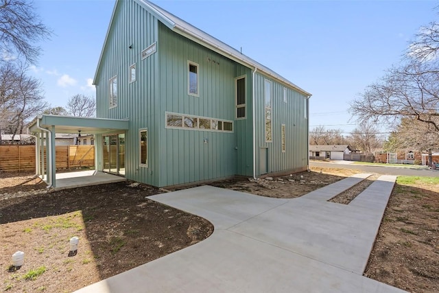 exterior space featuring a patio area and fence