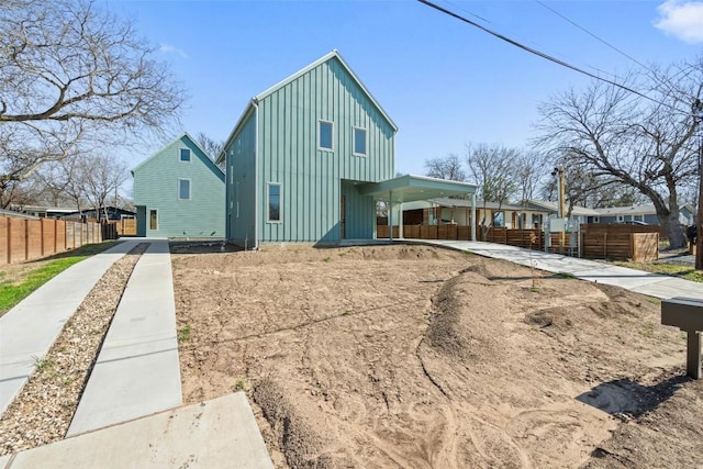 2912 Pecan Springs Rd, Austin, TX 78723 - view of home's exterior featuring board and batten siding