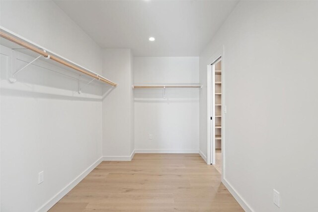 2912 Pecan Springs Rd, Austin, TX 78723 - spacious closet with wood finished floors