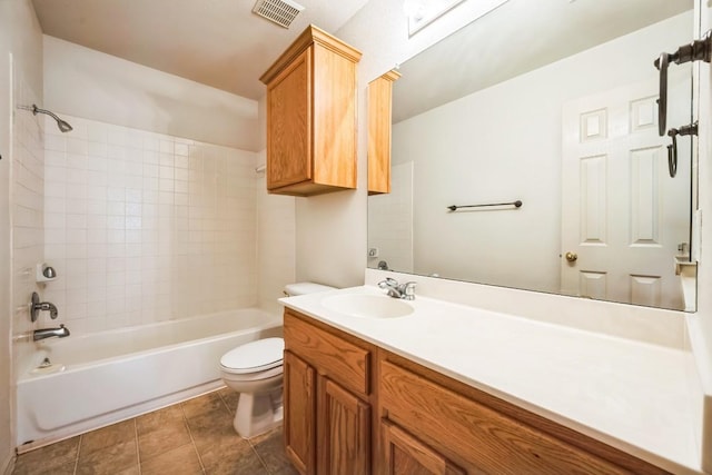 bathroom featuring visible vents, toilet, tile patterned flooring, bathtub / shower combination, and vanity