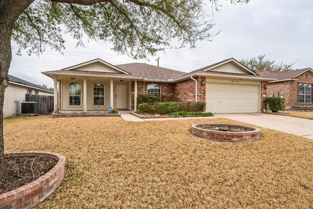 ranch-style home with central AC unit, driveway, a porch, a garage, and brick siding