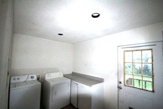 washroom with laundry area and independent washer and dryer