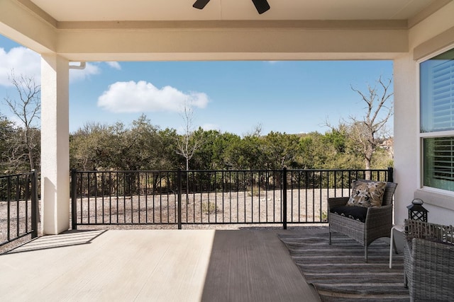 balcony featuring a ceiling fan