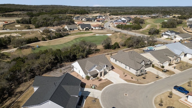 birds eye view of property with a residential view