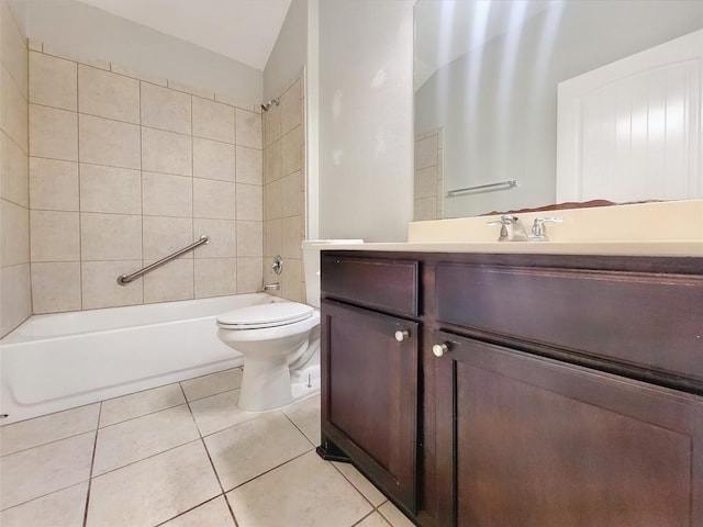 bathroom with tile patterned flooring, vanity, toilet, and bathing tub / shower combination