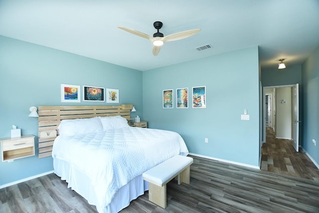 116 Dandelion Dr, Georgetown, TX 78633 - bedroom featuring wood finished floors, baseboards, and a ceiling fan