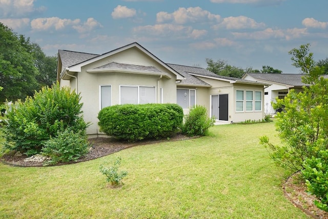 116 Dandelion Dr, Georgetown, TX 78633 - single story home with a front lawn and stucco siding